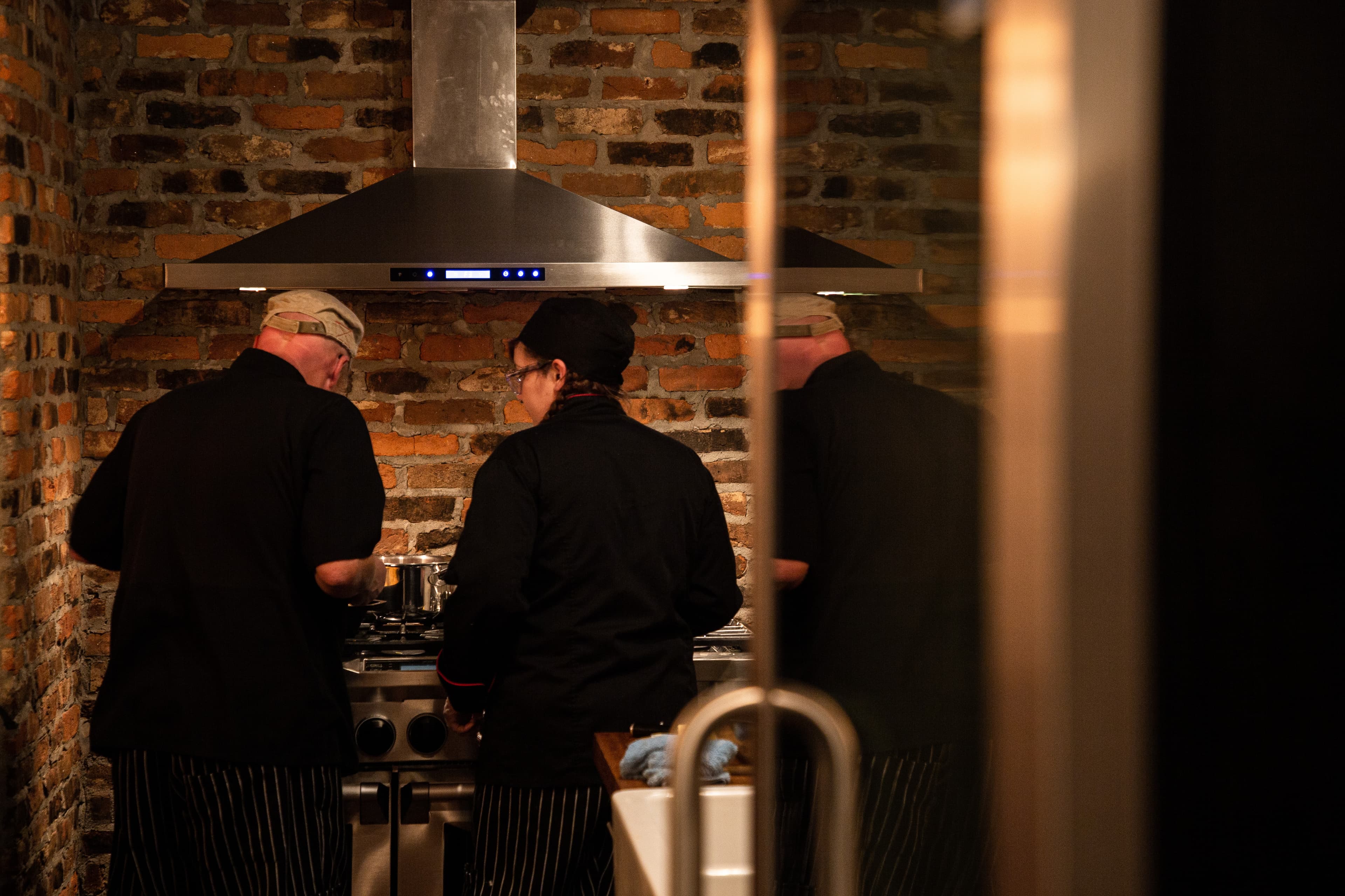 Chef preparing supper club dinner